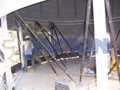 Grain storage silo lifting jacks and jacks for bolted tanks