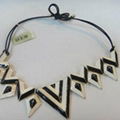 gold plated enamel triangle rope