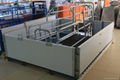 Farrowing crate with rotated feeder 4