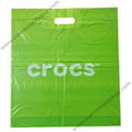 Patch handle plastic bag with virgin material