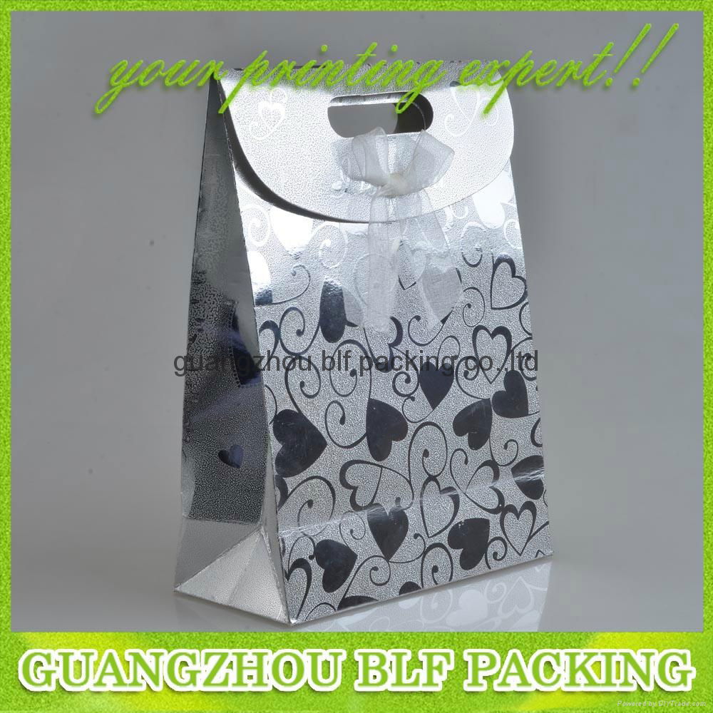 China cheap custom paper shopping bags 