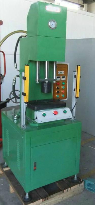 A small desktop hydraulic press 2