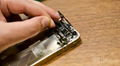 Iphone 4S sensor and power button flex cable replacement 2