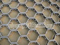 Hex metal anti-abrasive refractory