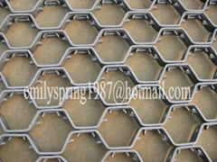 Hex metal anti-abrasive refractory lining