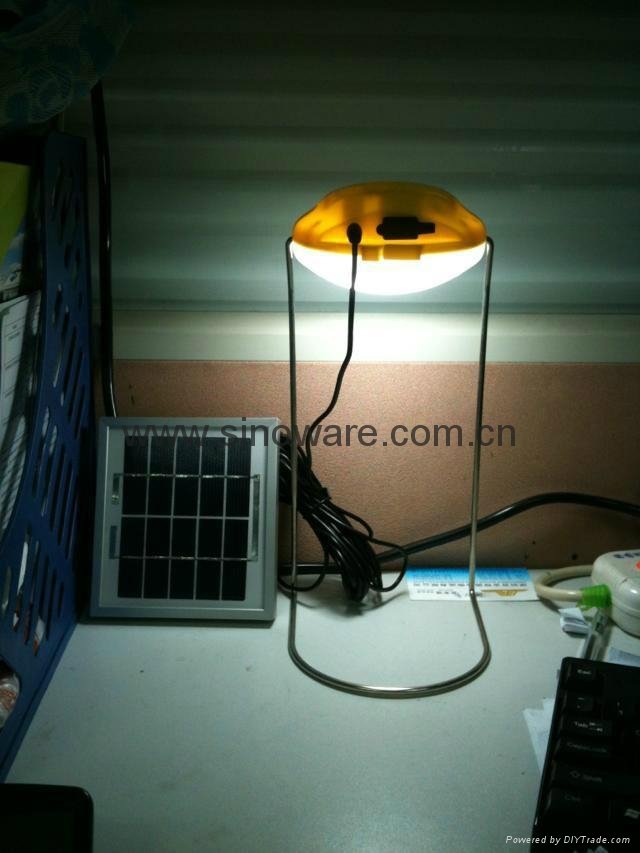 Portable solar led lantern with mobile phone chargers