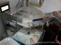 Used and new SUZUMO SGP-SNB Sushi Packing Machine 8