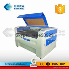 Laser cutting and engraving machine