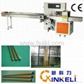 Servo Down Paper Pillow Packing Machine for Metal Pipe 1