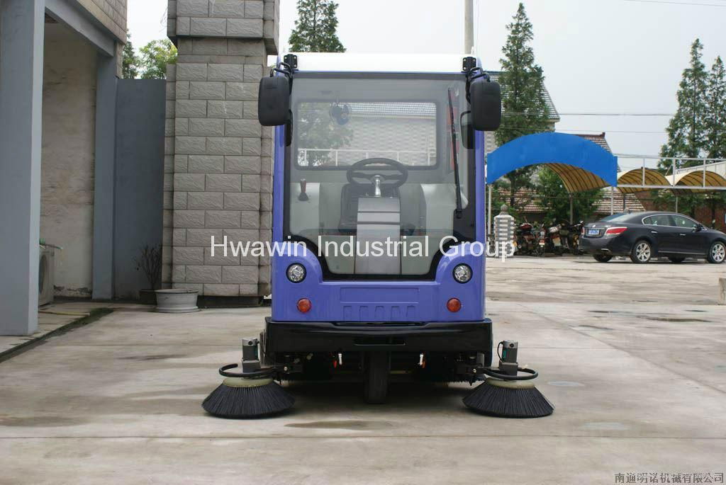 All closed electric ride on sweeper with spray device 4