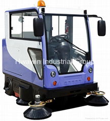 All closed electric ride on sweeper with spray device