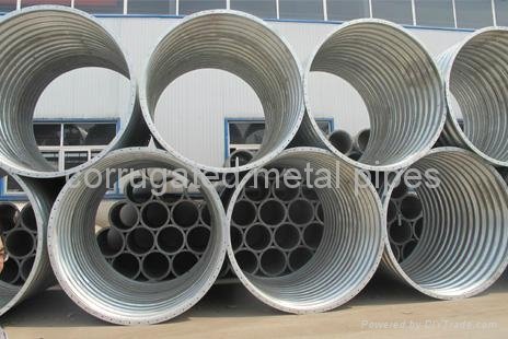 Annular flanged corrugated metal pipe
