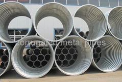 Annular flanged corrugated metal pipe