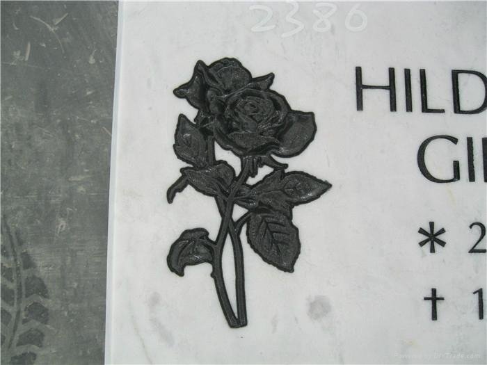 white marble headstone with flower carving 2