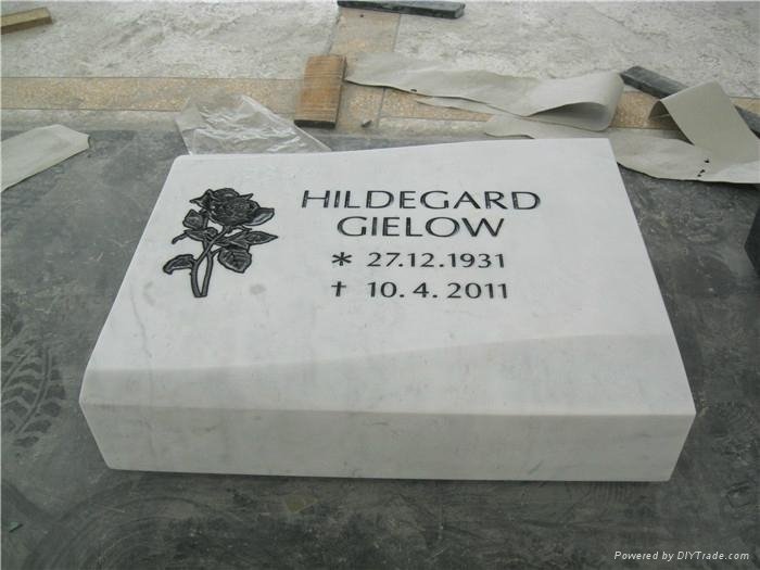 white marble headstone with flower carving 3