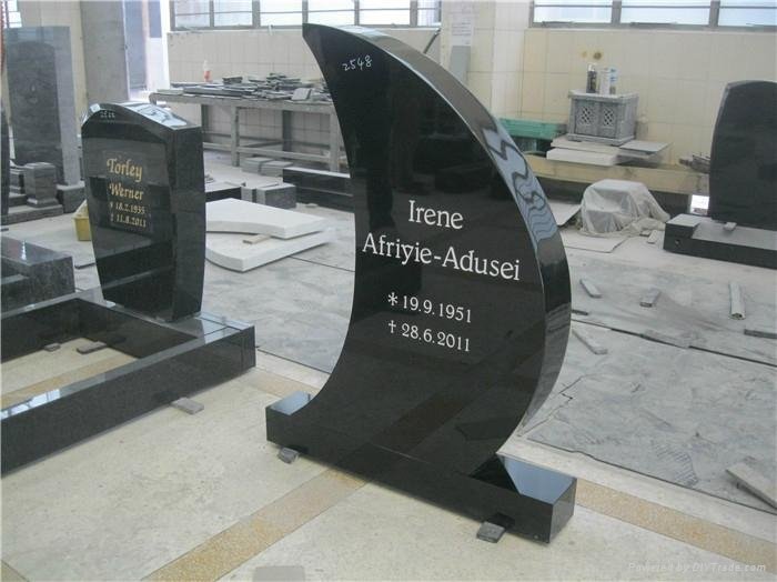 moon shape black polished upright tombstone with kerb