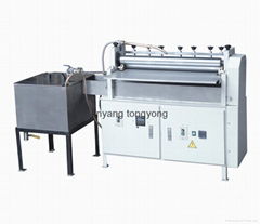Adjustable speed upper side hot melt gluing machine