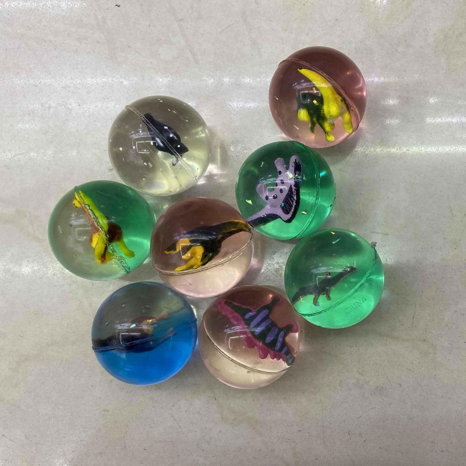 45mm high bouncing balls with 3D dinosaur figures