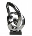 stainless steel artwork in silver