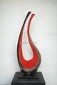 Abstract modern metal sculpture with marble stand 