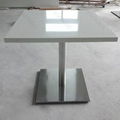 Elegant look man made stnoe dining table