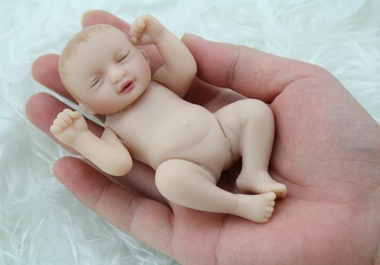 Newest design vinyl 4 inch baby dolls palm hand doll toy small vinyl reborn baby 3