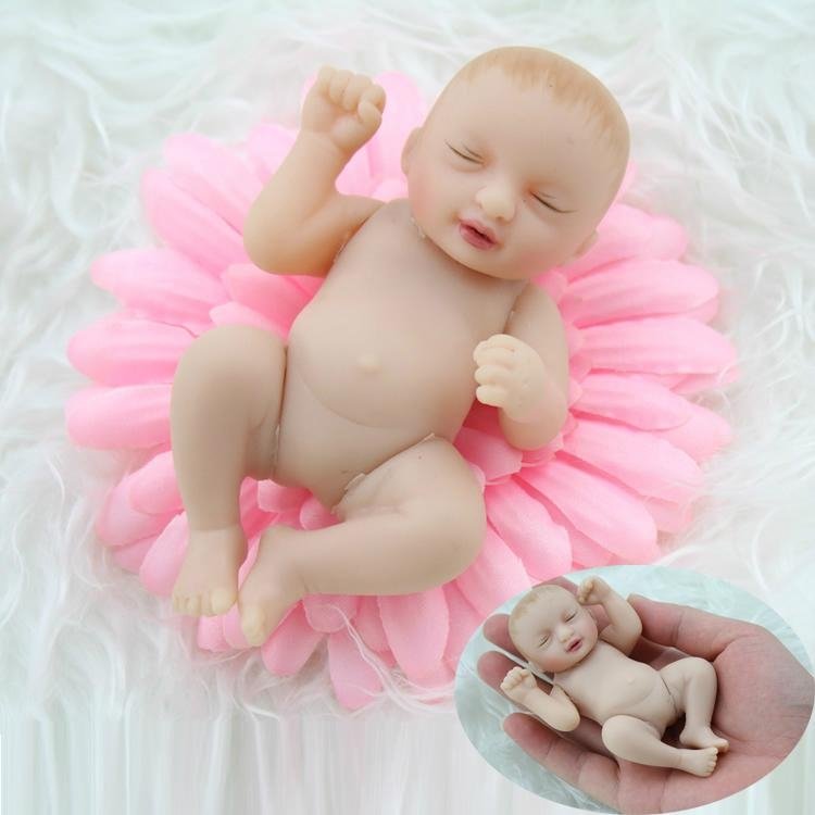Newest design vinyl 4 inch baby dolls palm hand doll toy small vinyl reborn baby