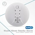 Battery operated photoelectric smoke detector 