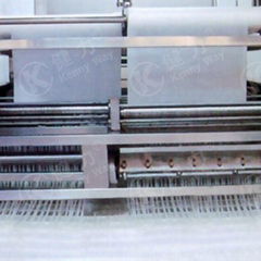 Automatic slitting conveyor