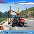 Highway guardrail post drilling machine