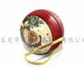 Christmas ball-shaped metal tin for