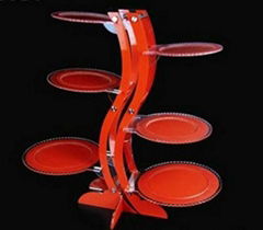 Red S shape acrylic and metal cake display 