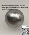 Solid iron ball with text punched 1