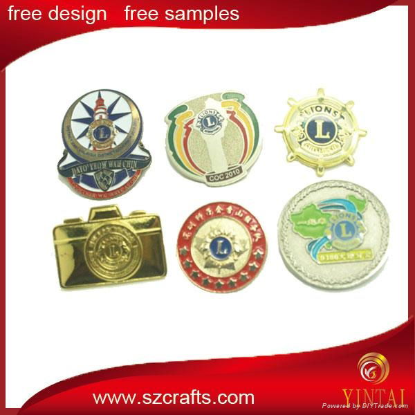 Gold plated enamel metal badge