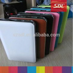 7000mAh thin leather feeling touch dual usb power bank for iphone ipad samsung 