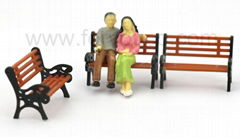 Mini outdoor bench with people's figure