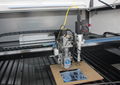 A1 head Reci 150w Co2 laser for metal non-metal cutting, A2 head Raycus 50W fiber laser for metal marking 