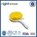 Silicone strainer with plastic handle