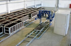 Automated concrete block making machine