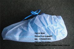 Disposable nonwoven shoe cover with plastic dot