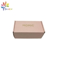 Corrugated pink shipping box with gold logo   4