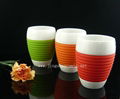 Ceramic porcelain coffee mug with silicone sleeve 1