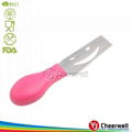 pink plastic handle cheese knife using 2