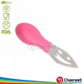 pink plastic handle cheese knife using 5