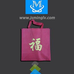 Disposable non-woven handle shopping bag