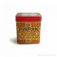 small rectangular metal tea tin