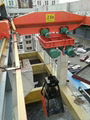 Single beam grab cranes