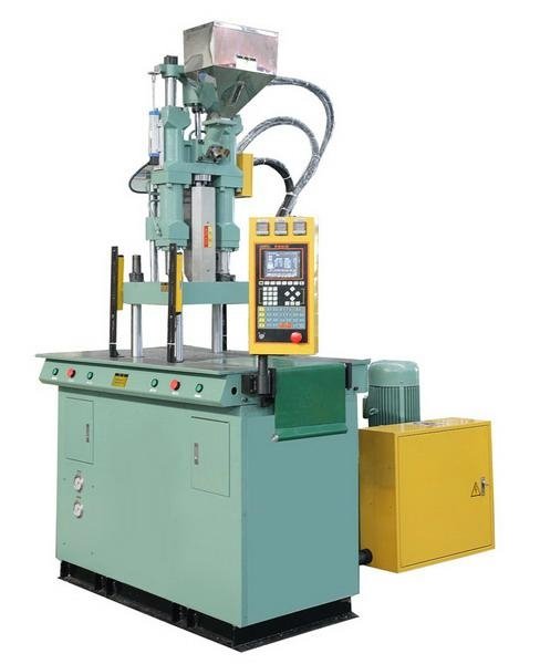 Vertical injection molding machine for cosmetic tube shoulder