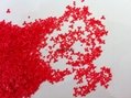 Novelty shaped speckles for detergent powder