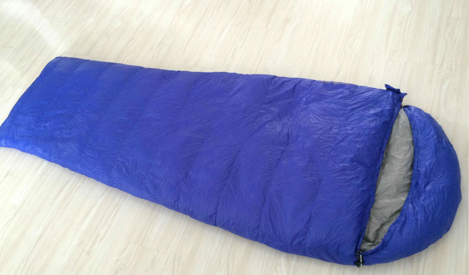 Down-filled mummy sleeping bag